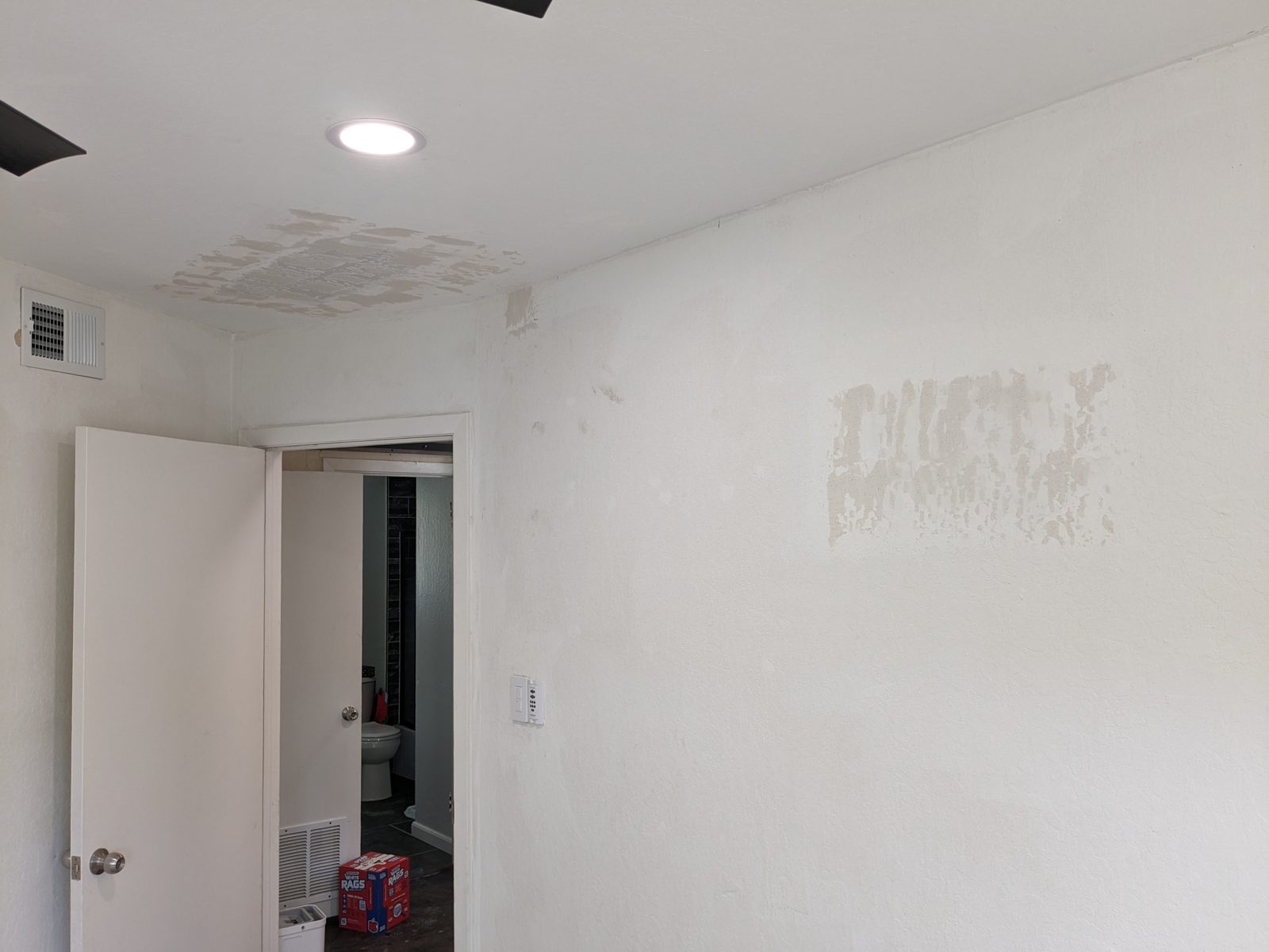 Interior wall prepared and patched before painting by Blair Handyman