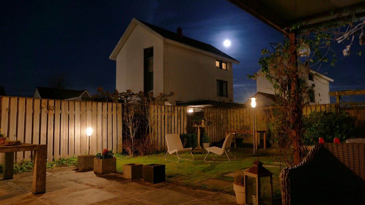 House with roofline lights on a clear night