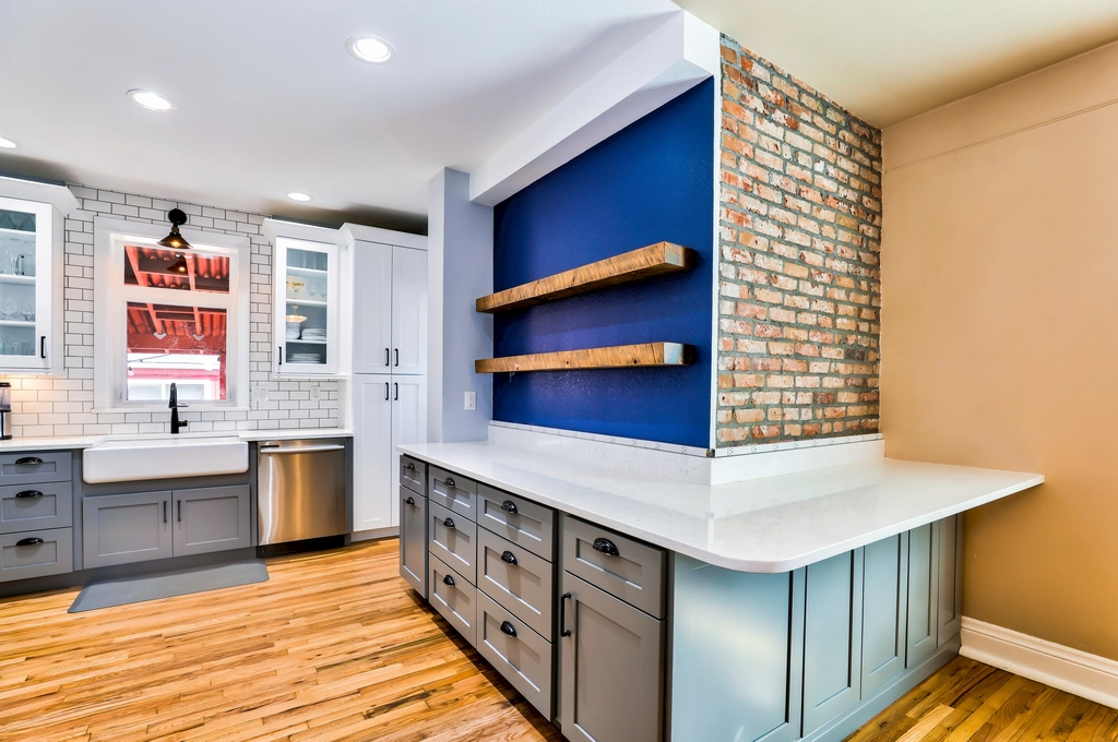 Remodeled kitchen with open shelves and hardwood floor